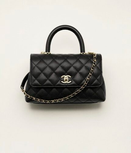 CHANEL FLAP BAG WITH TOP HANDLE