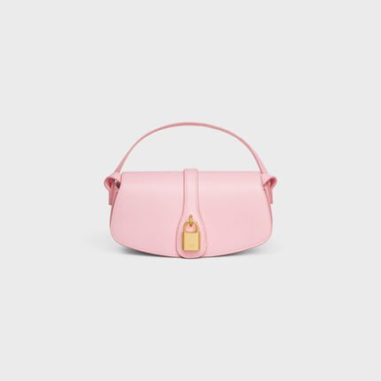 CLUTCH ON STRAP TABOU IN SMOOTH CALFSKIN PINK